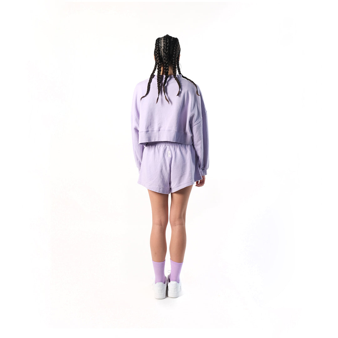 Crop Sweater in Soft Lilac or Digital Lavender. Cotton Baby Terry. Acid stonewashed. Relaxed fit.